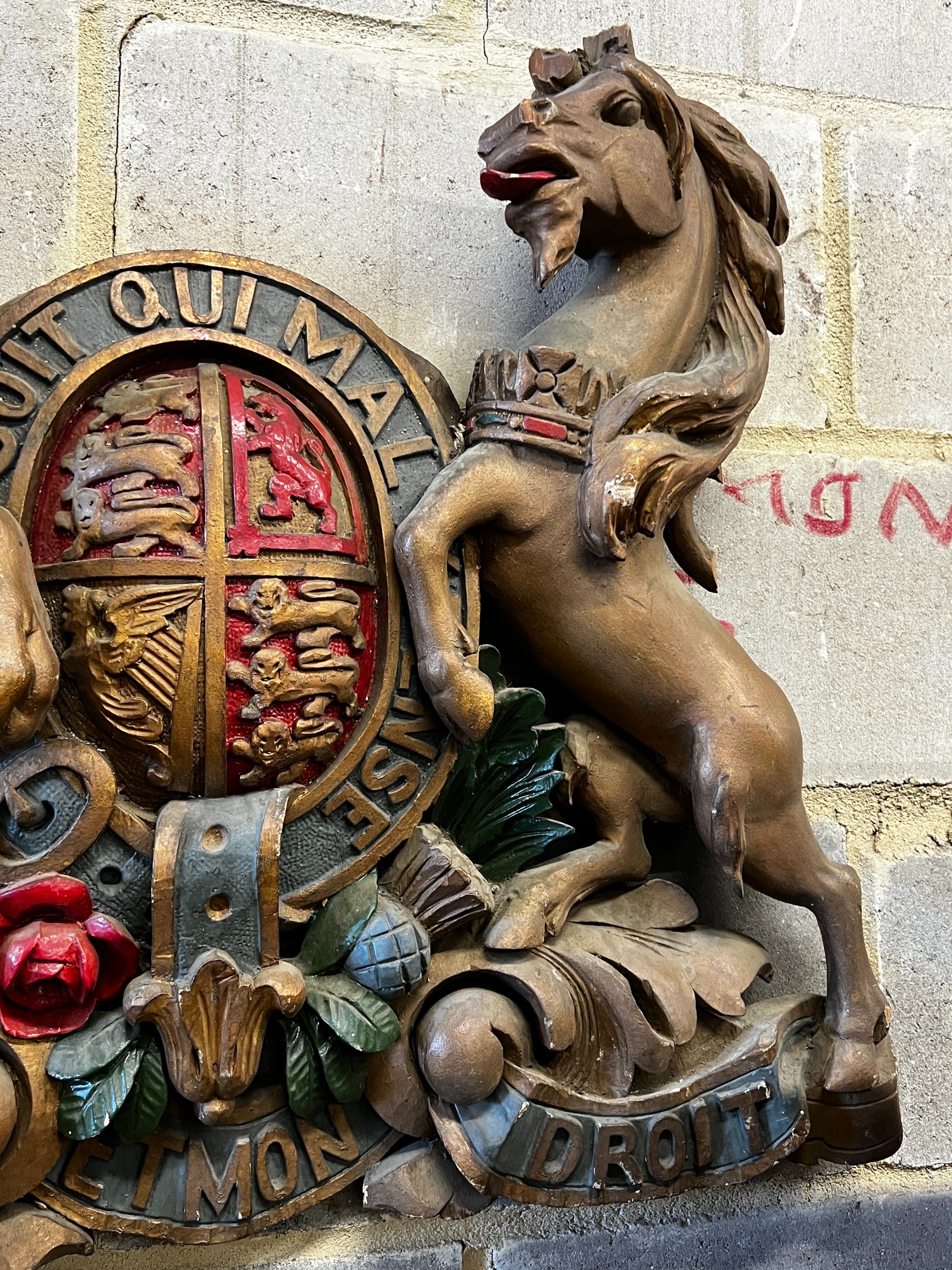 A painted carved wood Royal Coat of Arms, width 76cm, height 62cm